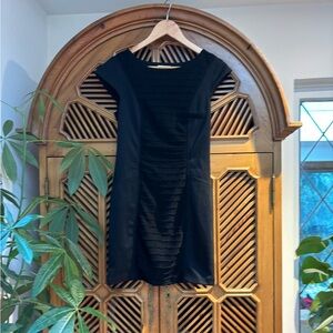 Black Cap-Sleeve Mini Dress - Sleek Day-to-Night Style